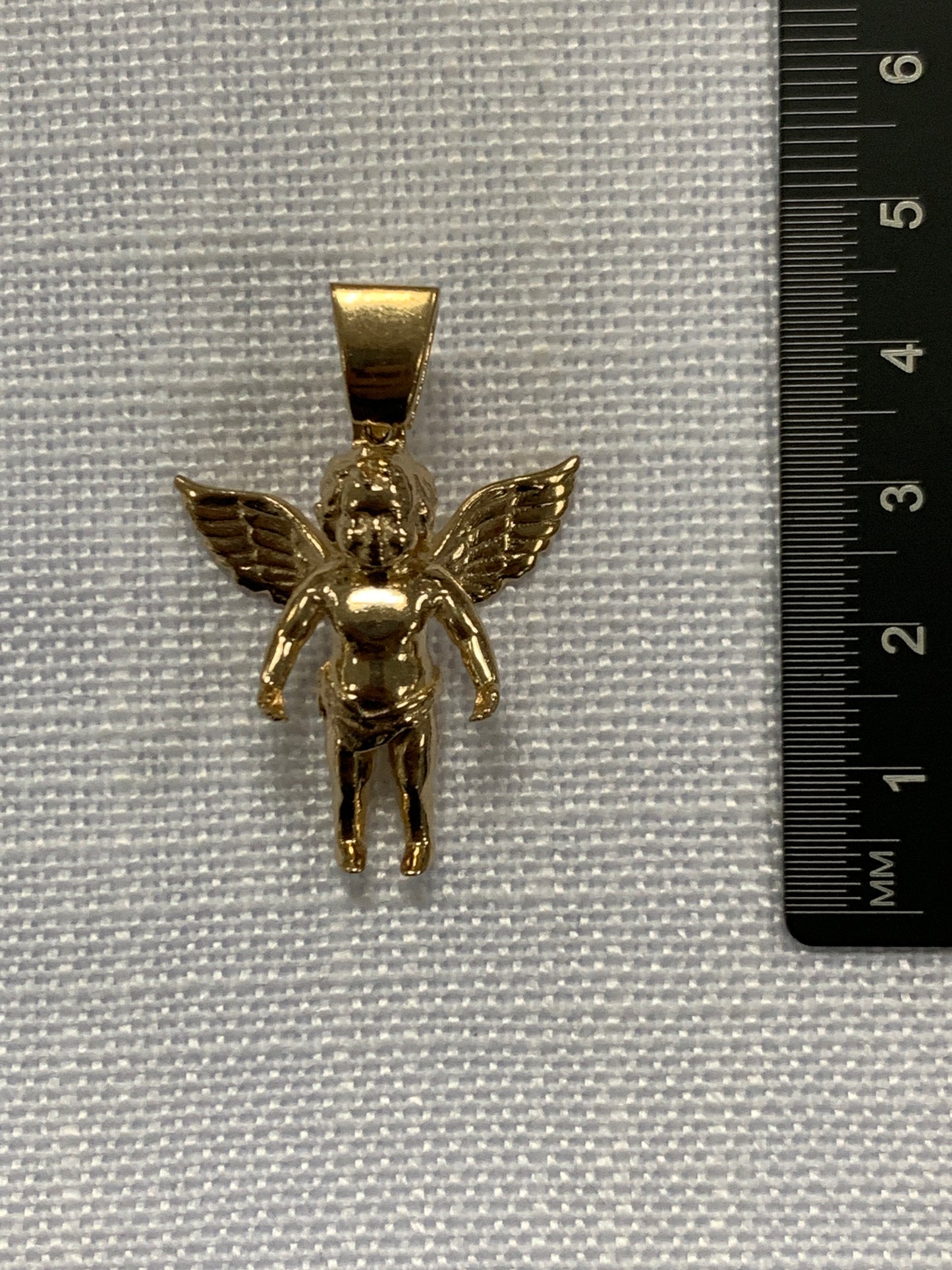 Angel or Cherub gold pendant