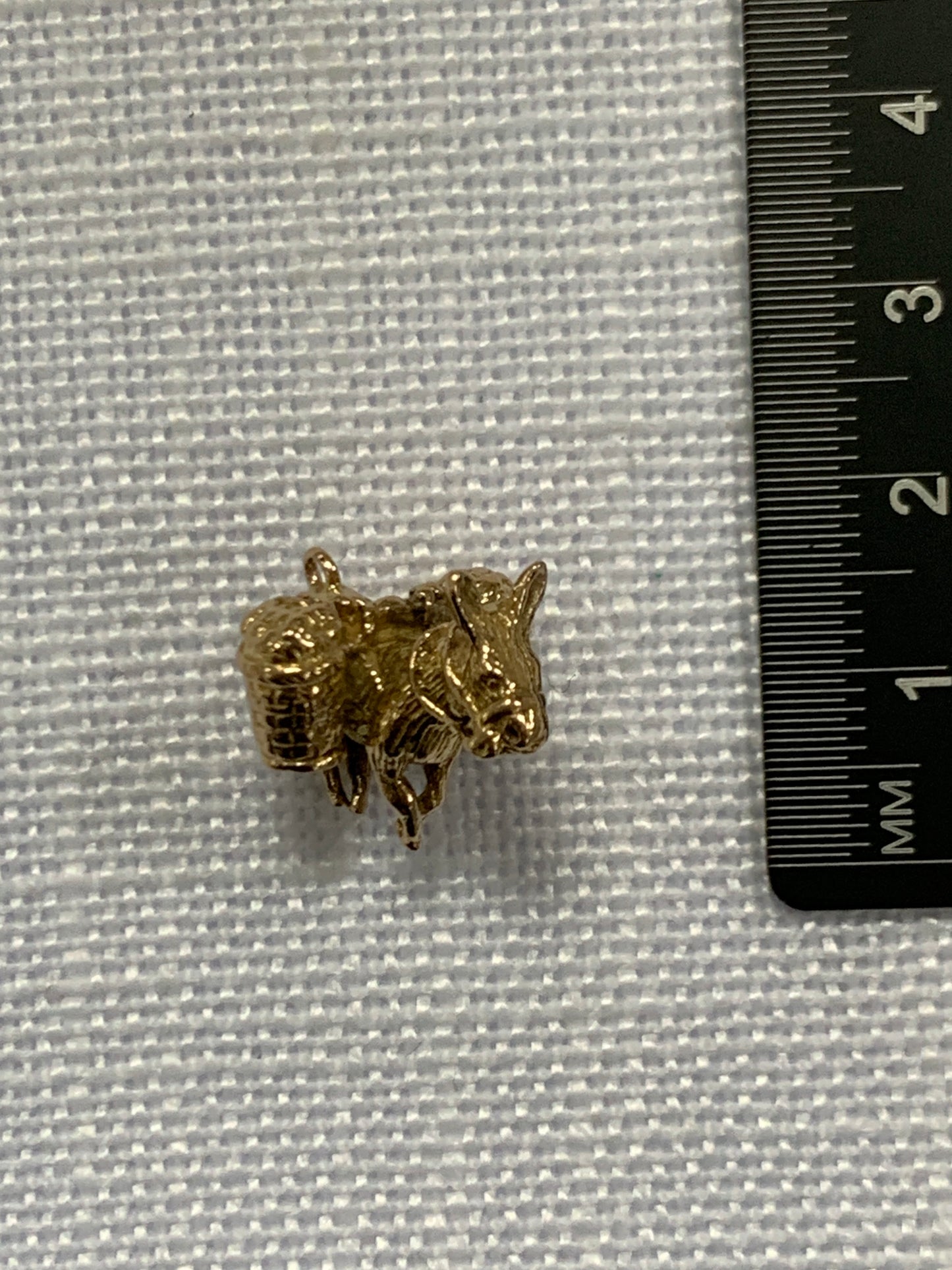 Donkey with baskets gold charm pendant