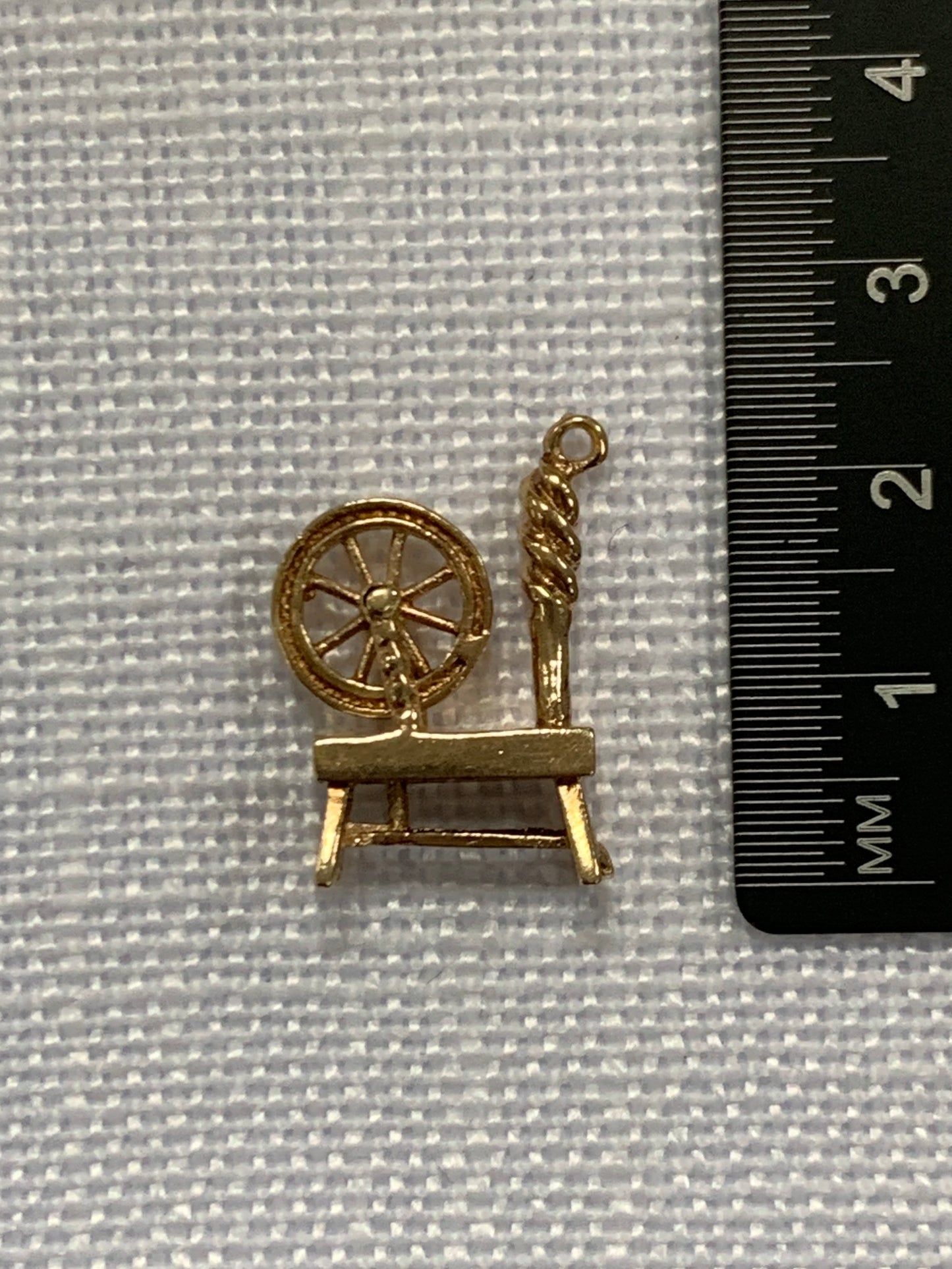 Yarn spinning wheel gold charm pendant