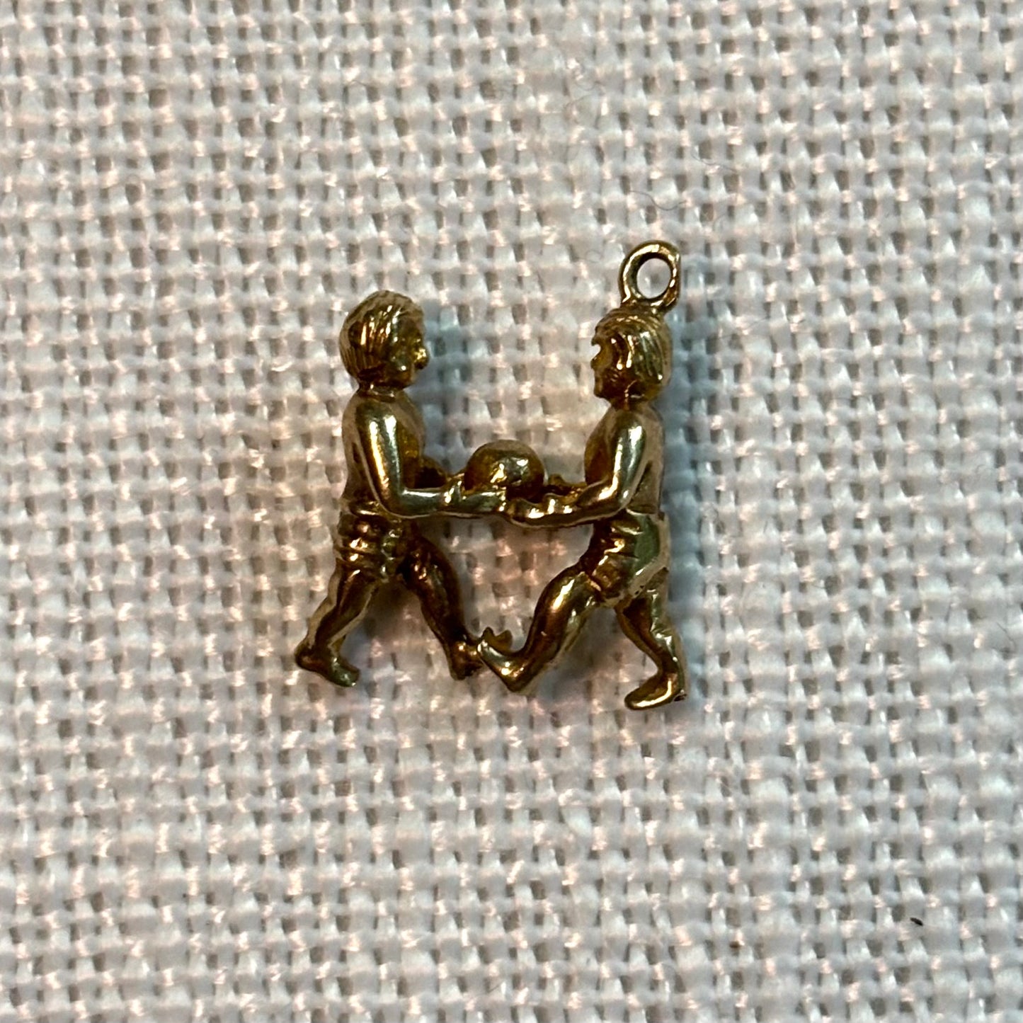 Two People Holding Gift Gold Charm