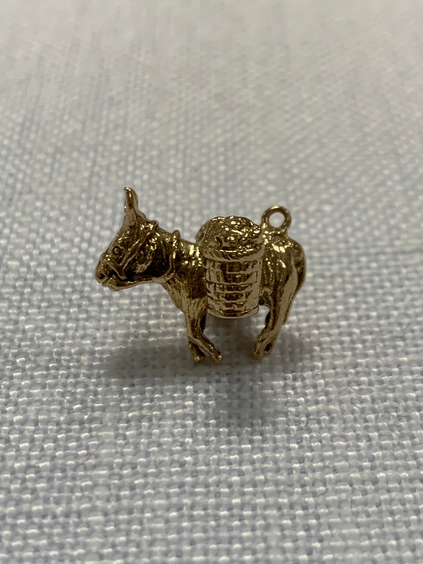 Donkey with baskets gold charm pendant