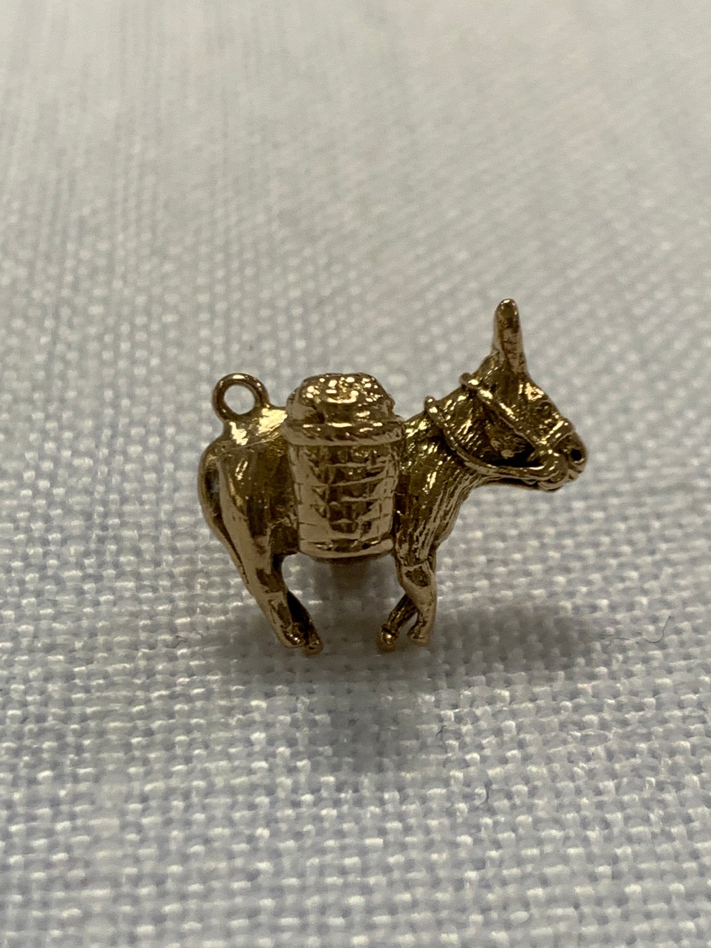 Donkey with baskets gold charm pendant