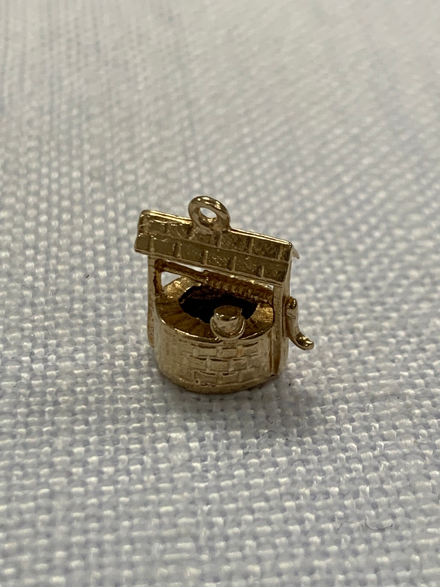 Wishing well gold charm pendant