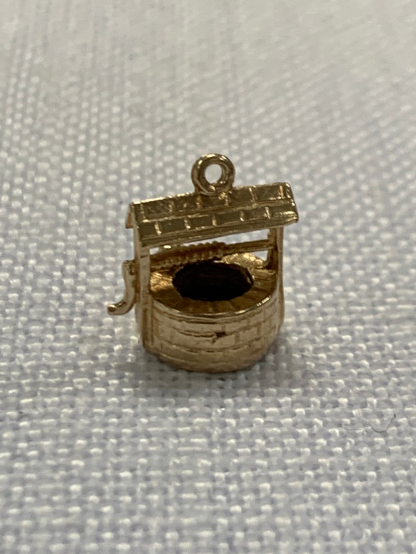 Wishing well gold charm pendant