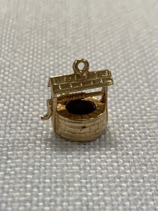 Wishing well gold charm pendant
