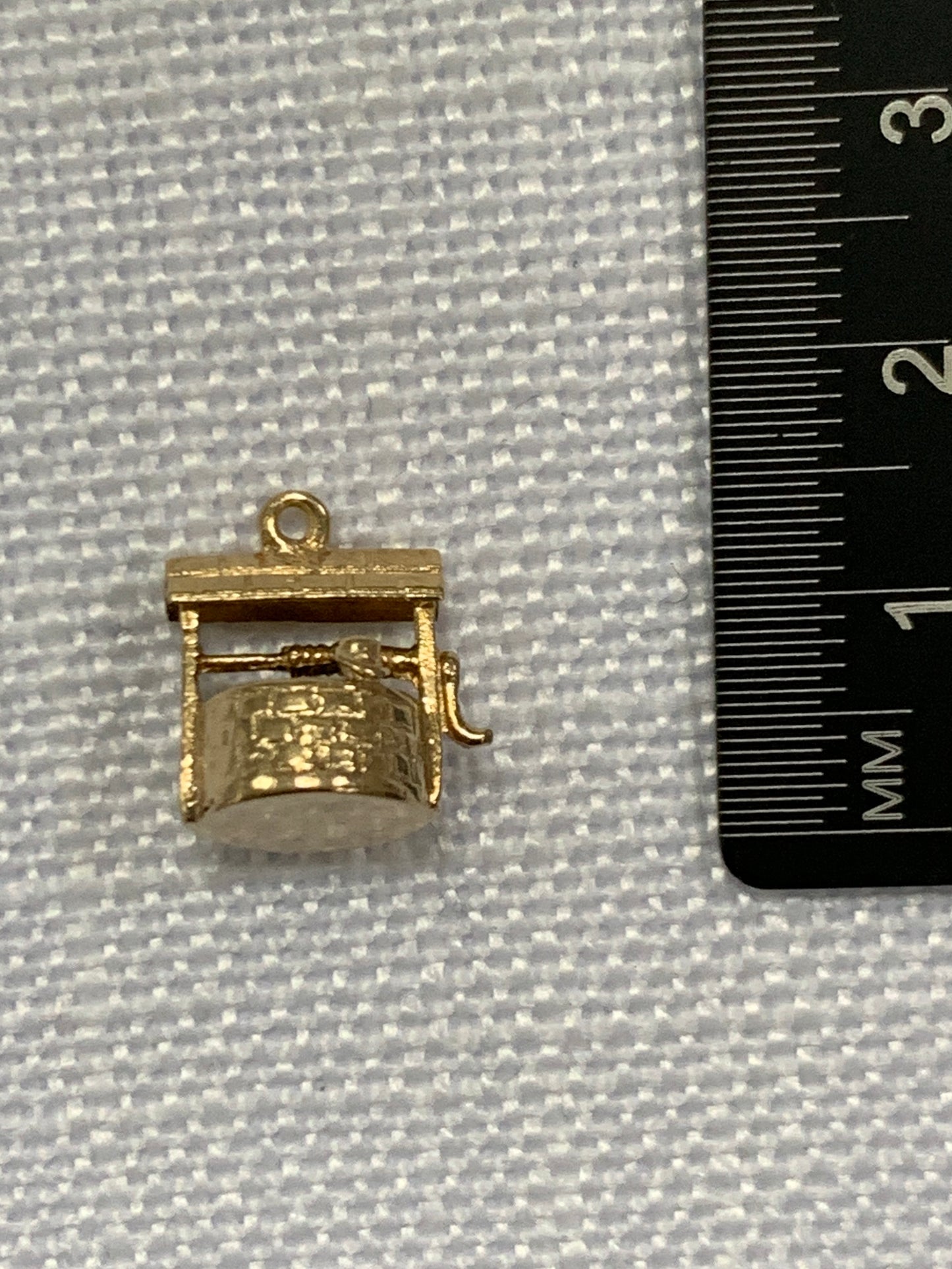 Wishing well gold charm pendant