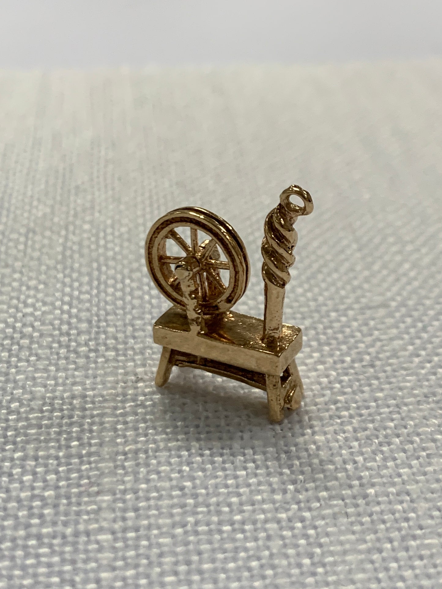 Yarn spinning wheel gold charm pendant