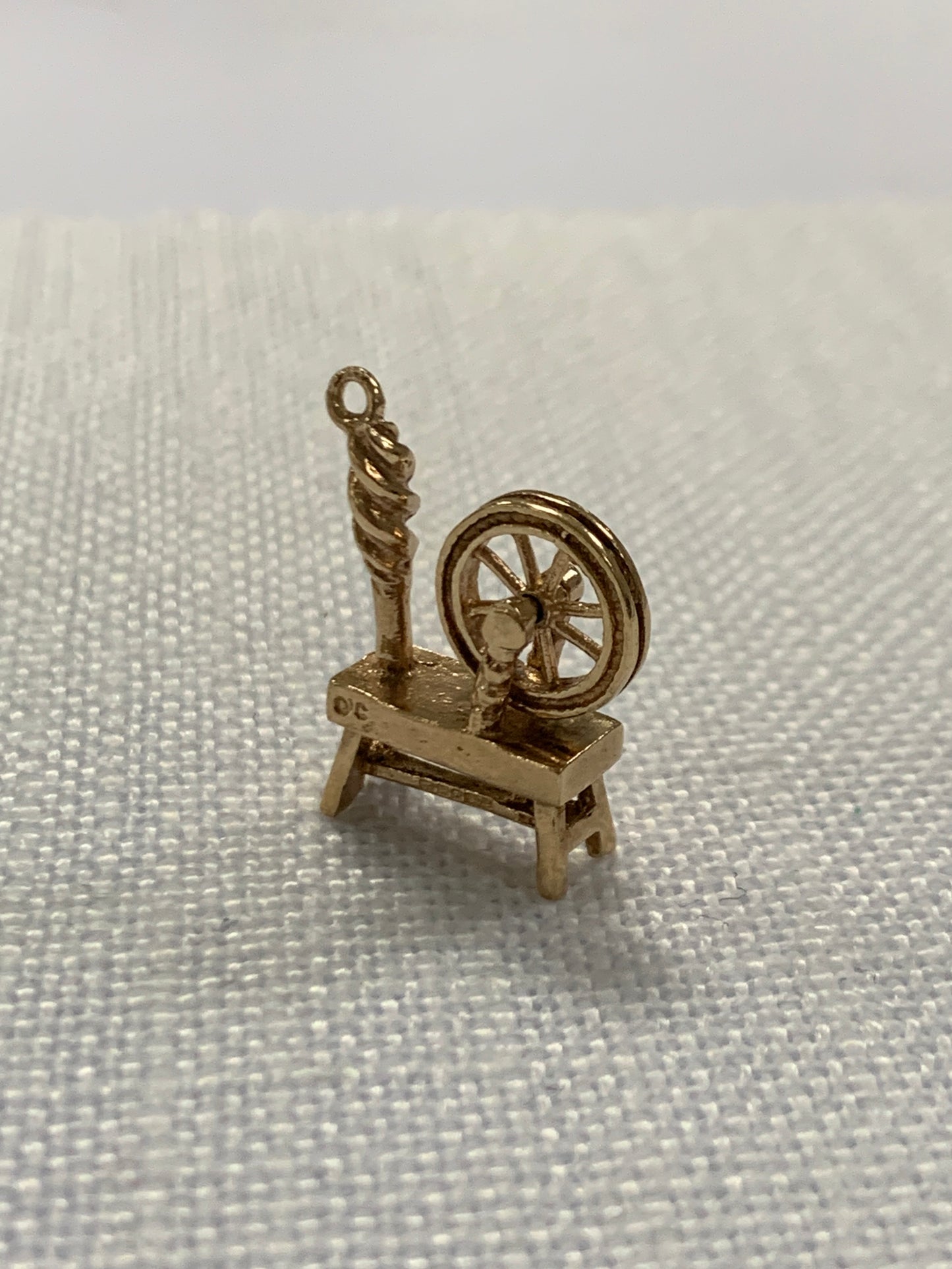 Yarn spinning wheel gold charm pendant