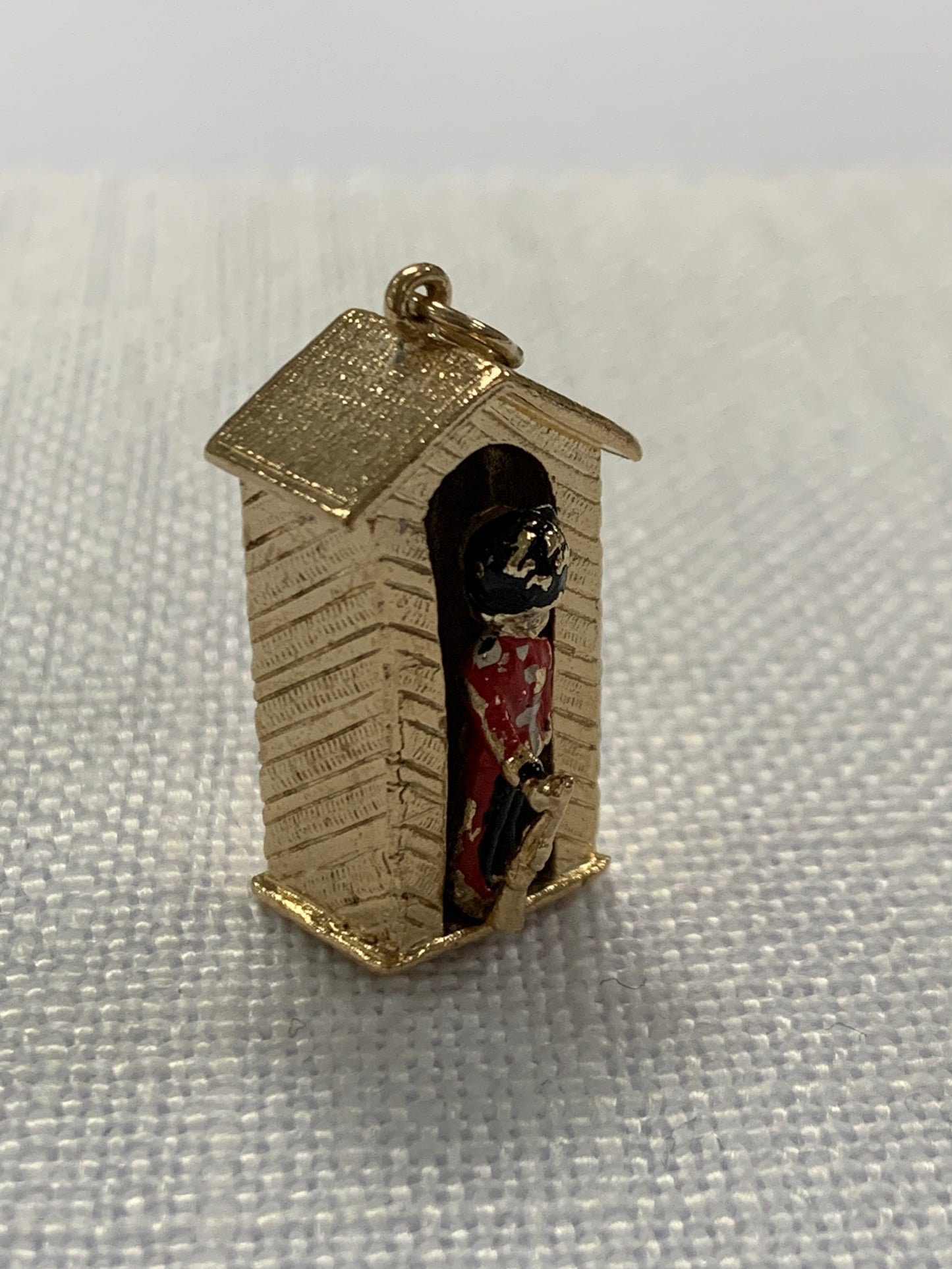 The King’s Guard in hut gold charm pendant