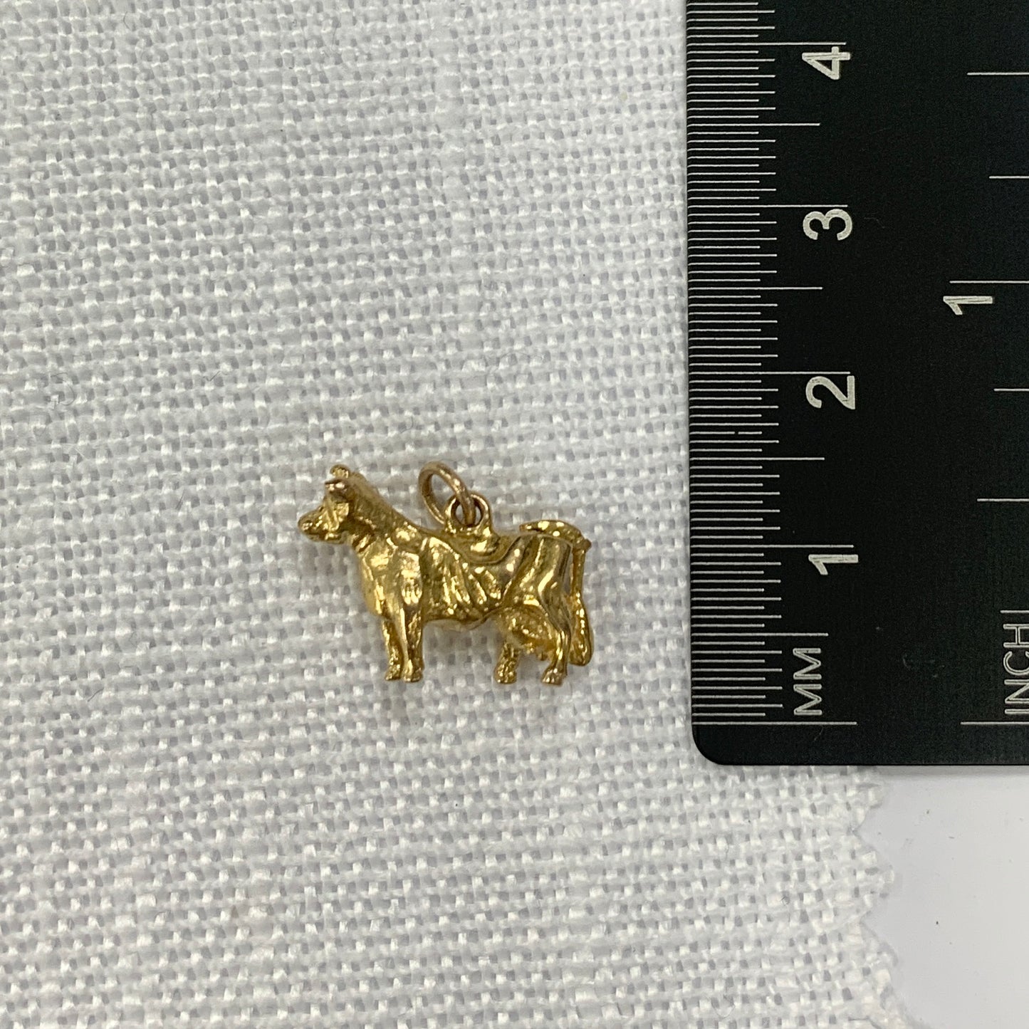 The Golden Cow Charm Pendant