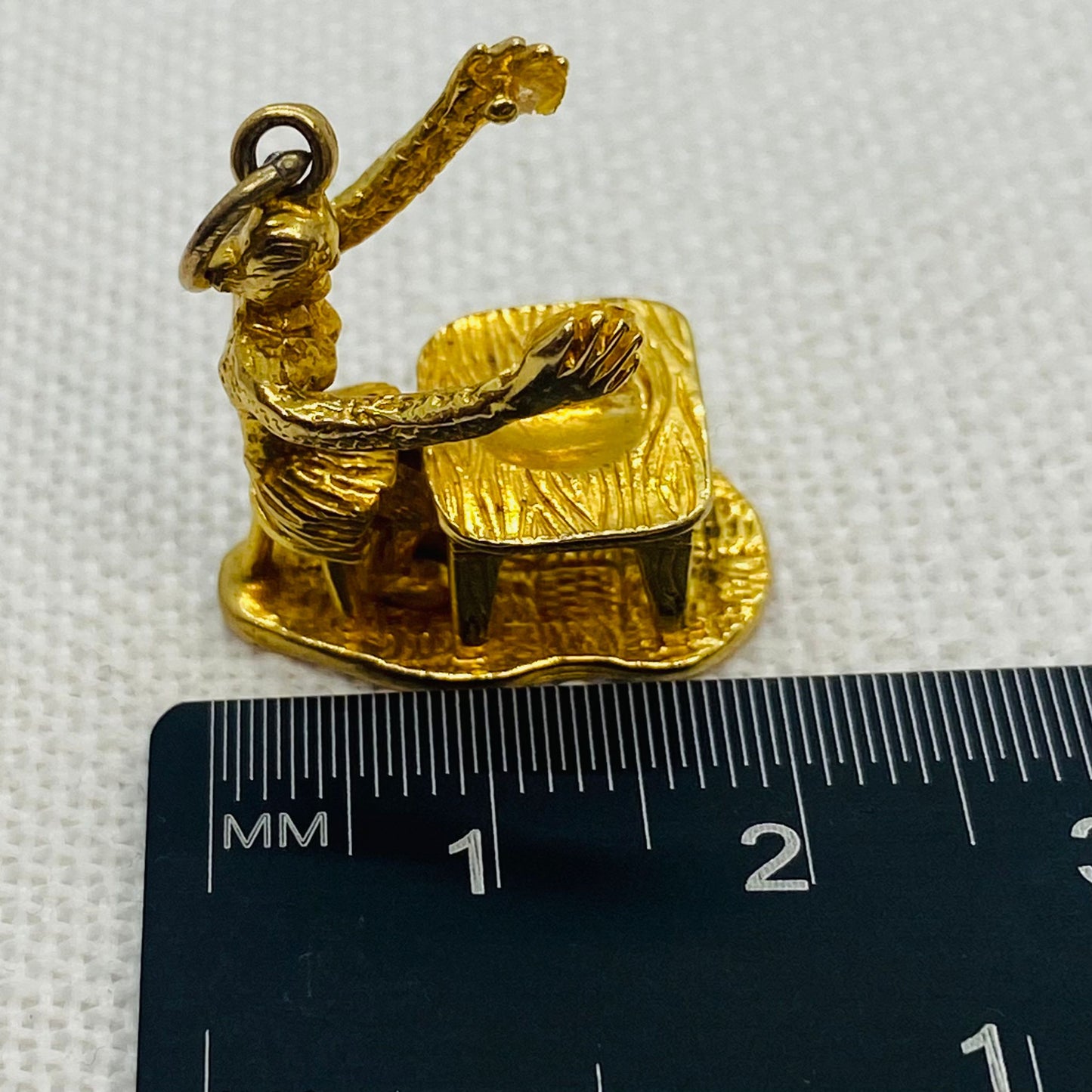 Person Sitting at Desk Vintage Gold Charm Pendant