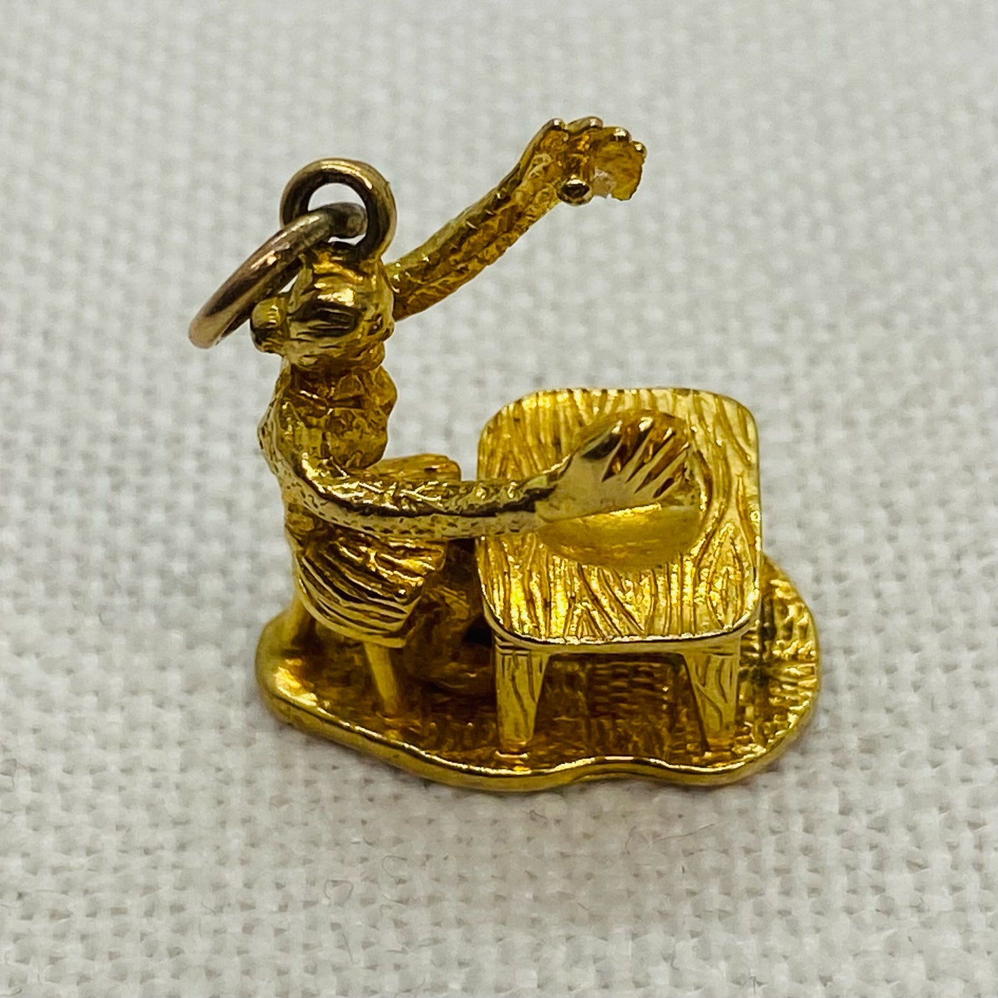 Person Sitting at Desk Vintage Gold Charm Pendant