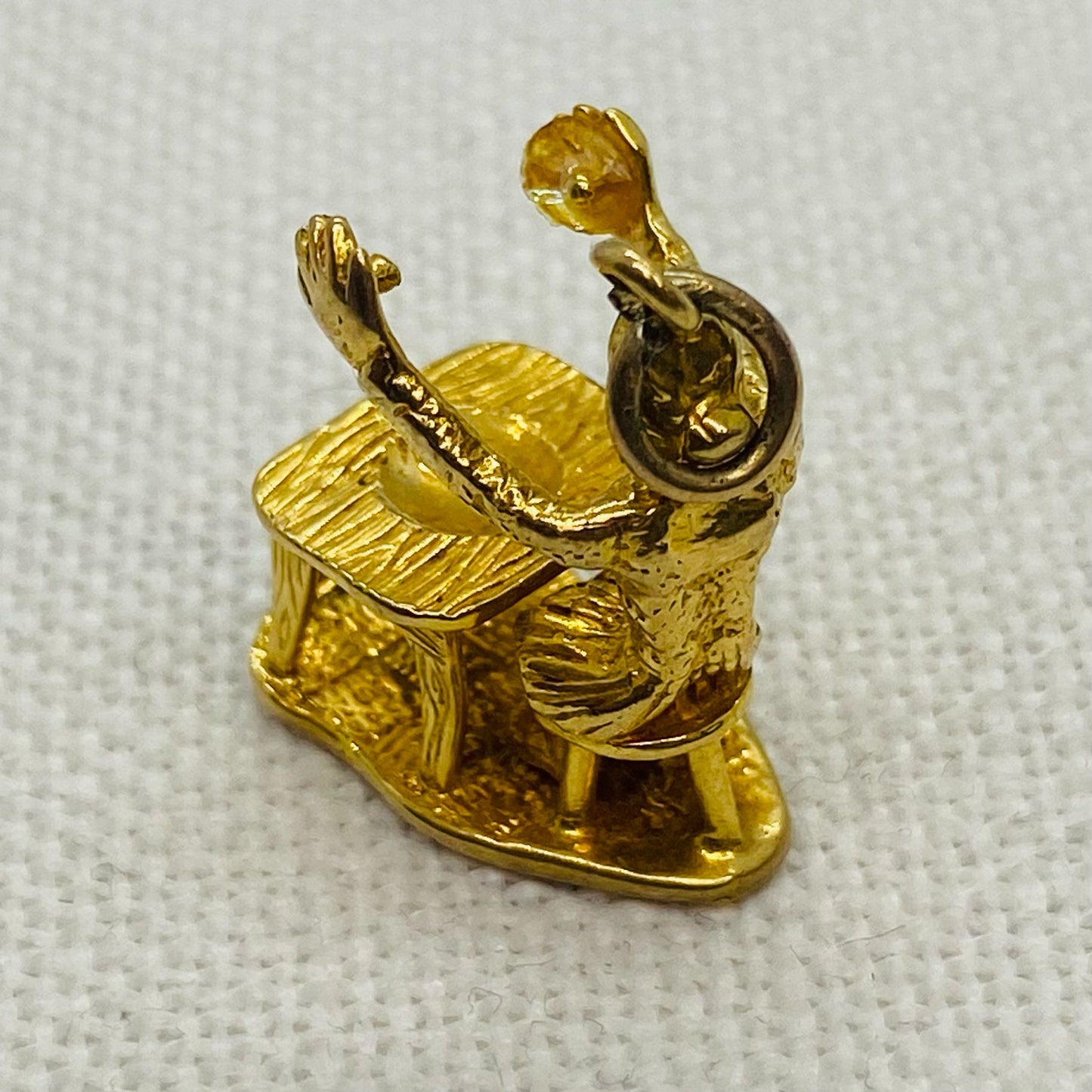 Person Sitting at Desk Vintage Gold Charm Pendant